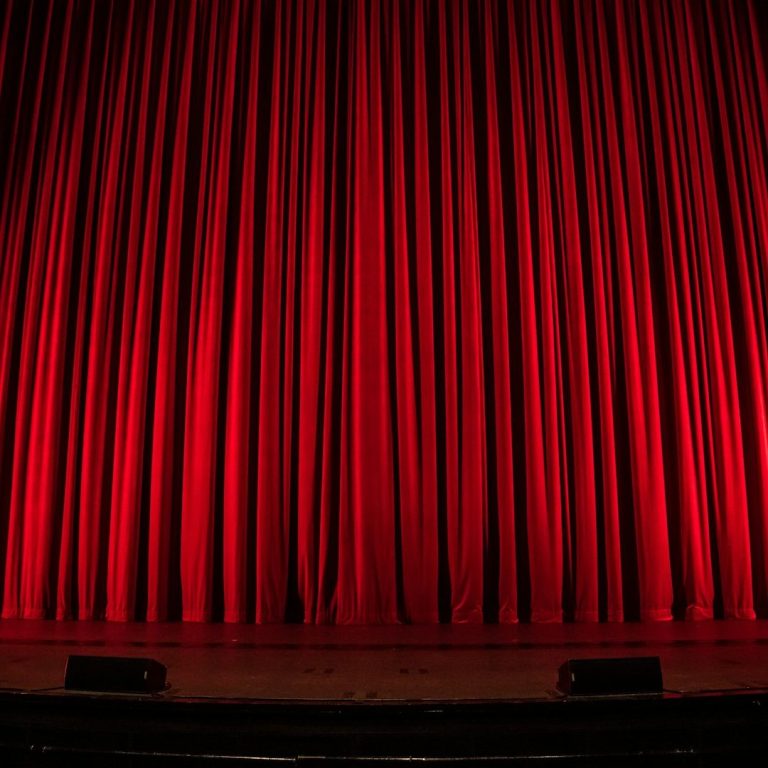 The Magic of Performing Arts A theatre curtain